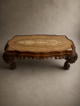 A C19th carved low Italian carved walnut table with onyx top