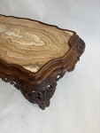 A C19th carved low Italian carved walnut table with onyx top