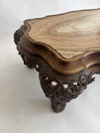 A C19th carved low Italian carved walnut table with onyx top