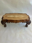 A C19th carved low Italian carved walnut table with onyx top