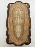 A C19th carved low Italian carved walnut table with onyx top
