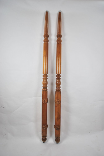 A pair of 19th century Birch wood bed posts