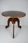 A British Colonial teak table, circa 1900.