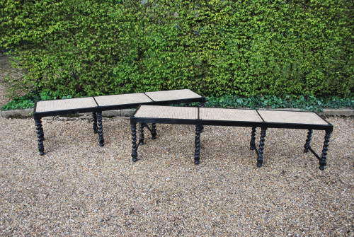 Pair of 20th century ebony benches