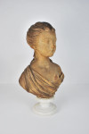 Terracotta bust of a young woman, 19th century, French, raised on a marble socle base
