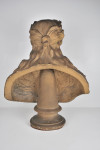 An antique plaster bust portrait of the young virgil after John Cheere, wearing a laurel wreath and toga, on a turned socle