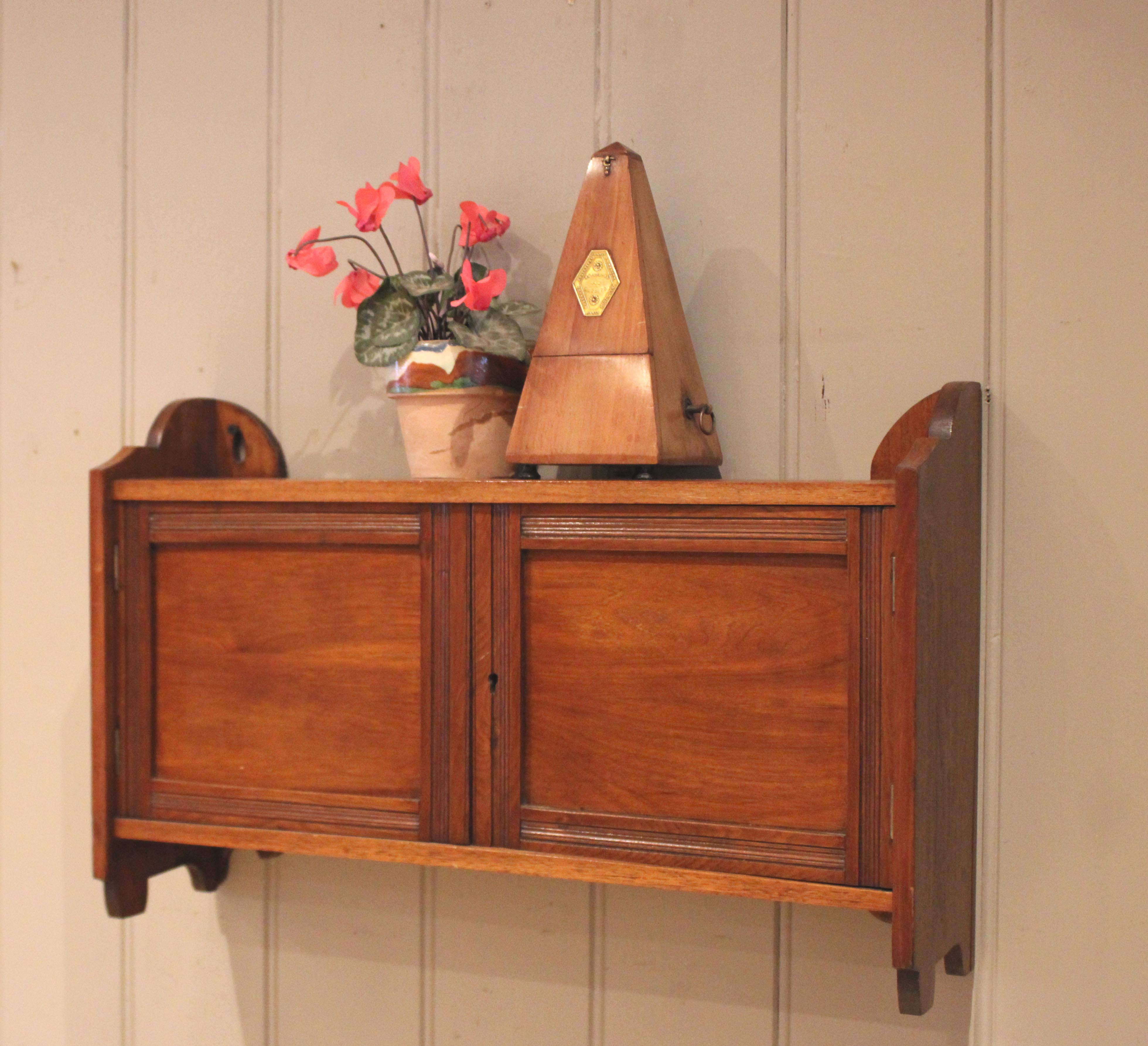 Small Two Door Mahogany Wal Cabinet